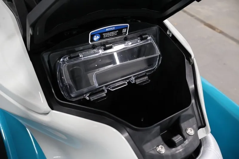 Slide: The Image of 2026 Sea-Doo GTI SE 170 storage compartment with clear lid and secure latch. - 4