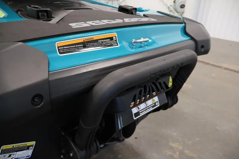 Slide: The Image of 2026 Sea-Doo GTI SE 170, rear view, showcasing design and warning labels. - 5