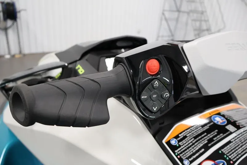 Slide: The Image of Handlebar controls of a 2026 Sea-Doo GTI SE 170 watercraft, featuring ergonomic grip and buttons. - 8