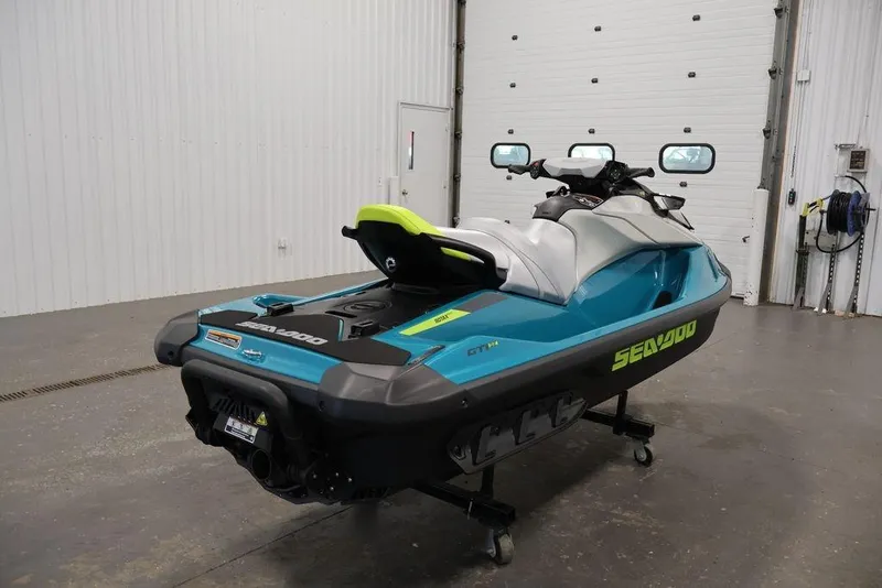 Slide: The Image of 2026 Sea-Doo GTI SE 170 jet ski in a garage setting. - 9