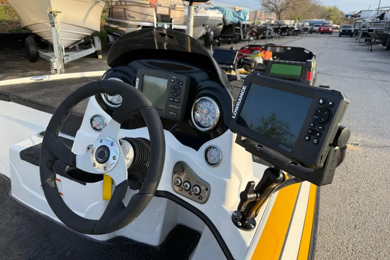 Slide: The Image of Steering console of a 2015 Nitro Z-6 boat with Lowrance electronics. - 23