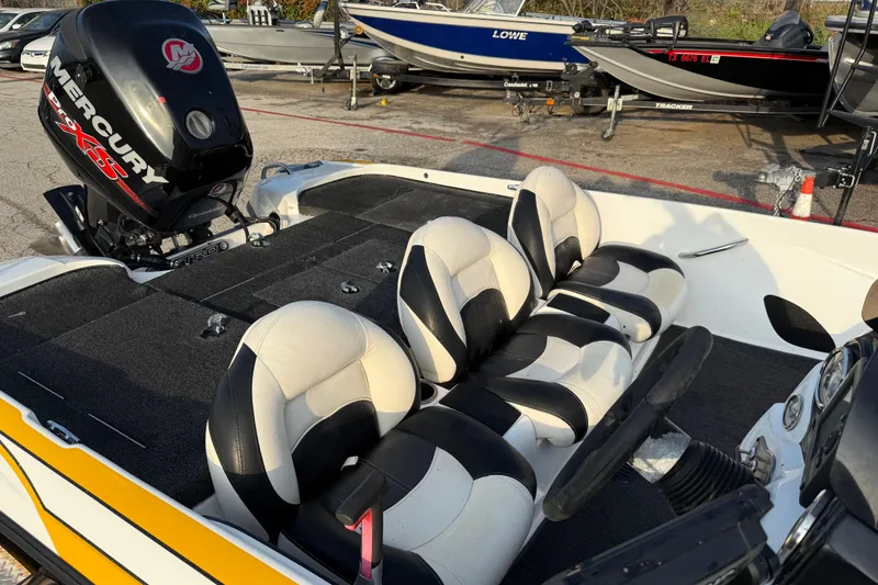 Slide: The Image of 2015 Nitro Z-6 boat with Mercury engine, featuring black and white seating. - 24