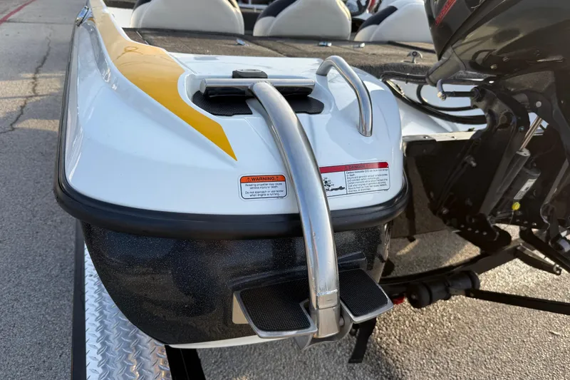 Slide: The Image of 2015 Nitro Z-6 boat rear view with motor and safety warnings. - 25