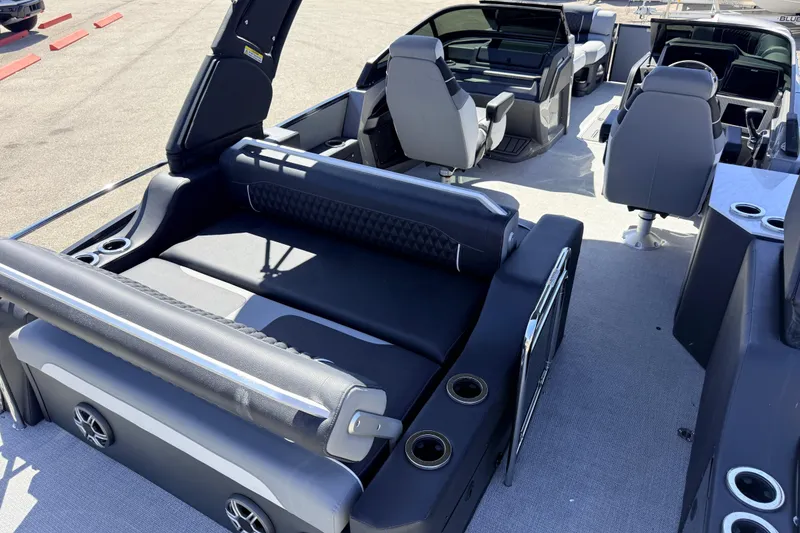 Slide: The Image of 2026 Avalon 2585 Excalibur LTD boat interior with luxurious seating and modern design. - 11