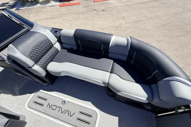 Slide: The Image of Luxurious seating on 2026 Avalon 2585 Excalibur LTD Windshield Flex Lounge boat. - 16