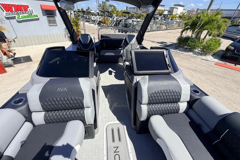 Slide: The Image of 2026 Avalon 2585 Excalibur LTD boat interior with luxurious seating and modern design. - 17