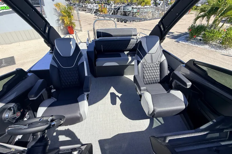 Slide: The Image of 2026 Avalon 2585 Excalibur LTD boat interior with luxurious seating and modern design. - 18