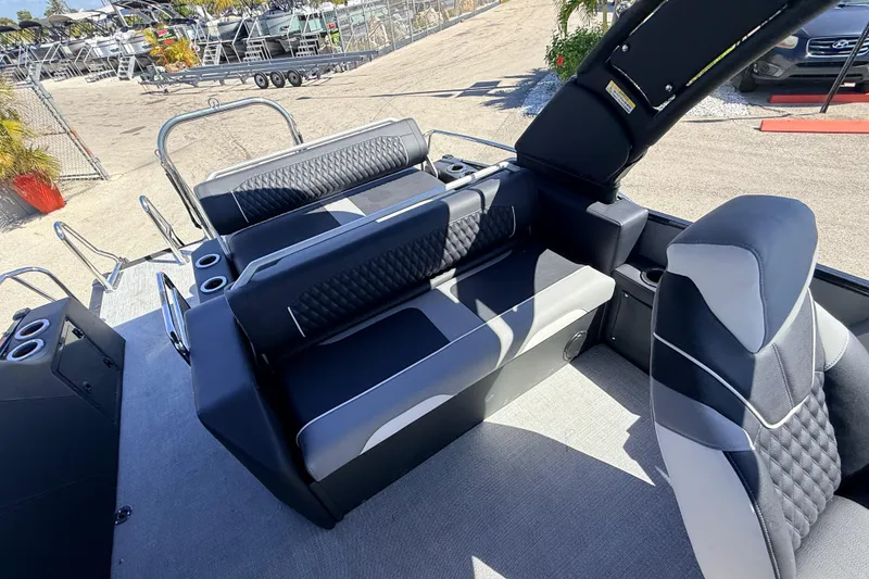 Slide: The Image of 2026 Avalon 2585 Excalibur LTD boat interior with luxurious seating and modern design. - 19