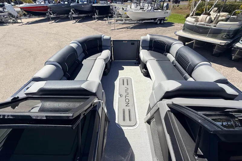 Slide: The Image of 2026 Avalon 2585 Excalibur LTD pontoon boat with luxurious seating and high-performance design. - 27
