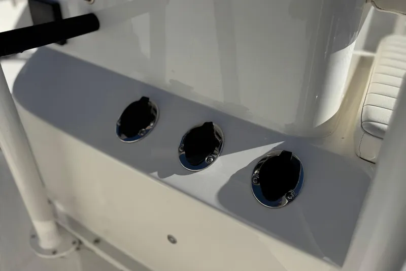 Slide: The Image of Close-up of 2022 Trophy T18 boat rod holders on a white surface. - 13