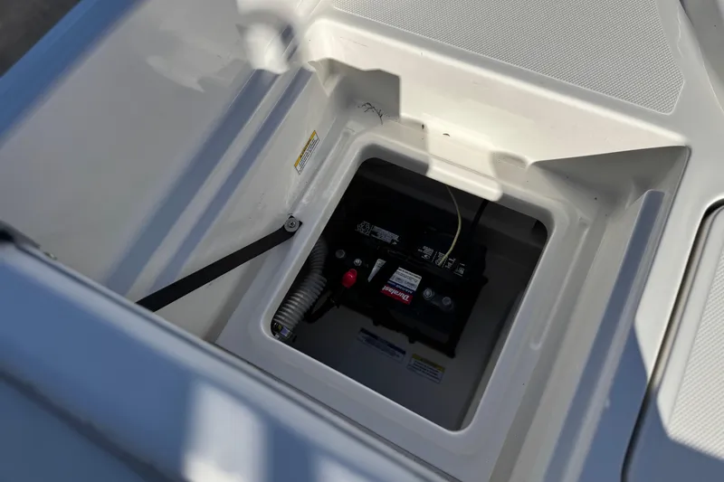 Slide: The Image of Battery compartment of 2022 Trophy T18 boat, showcasing internal setup. - 20