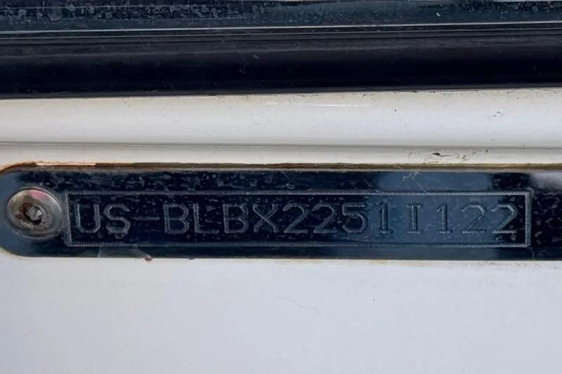 Slide: The Image of Close-up of a 2022 Trophy T18 model identification plate with serial number. - 29