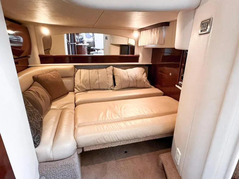Slide: The Image of Luxurious interior of 2008 Sea Ray Sundancer yacht with plush seating and elegant decor. - 9