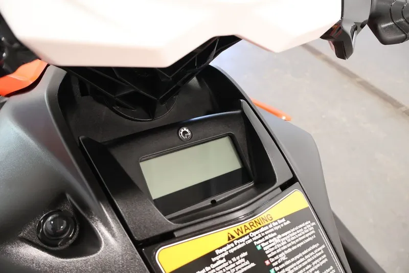 Slide: The Image of 2026 Sea-Doo Spark for 2 dashboard with digital display and warning label. - 15
