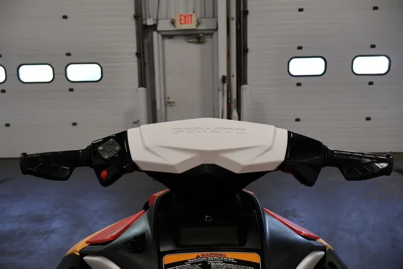 Slide: The Image of 2026 Sea-Doo Spark for 2 handlebars in a garage setting. - 16
