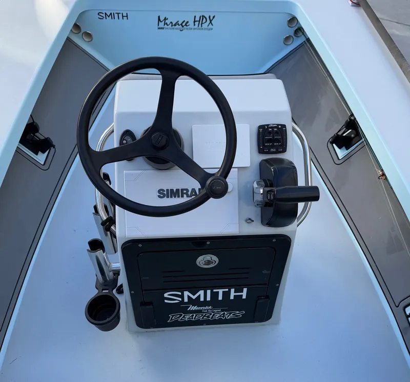 Slide: The Image of Steering console of a 2021 Maverick 17 HPX-S boat. - 15