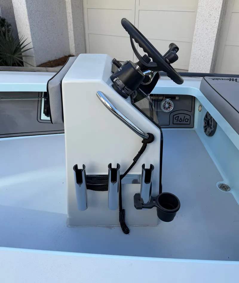 Slide: The Image of Steering console of a 2021 Maverick 17 HPX-S boat. - 16