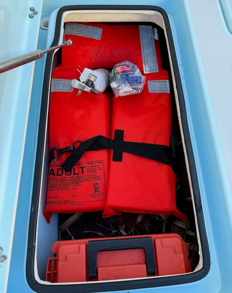 Slide: The Image of Red life jackets and gear in Maverick 17 HPX-S boat, 2021 model. - 25