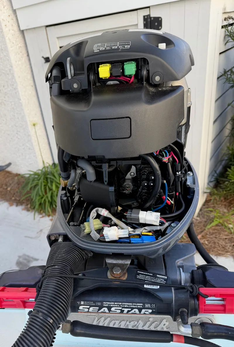 Slide: The Image of Open engine of a 2021 Maverick 17 HPX-S boat. - 43