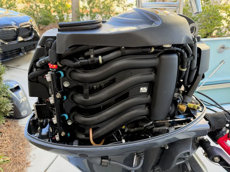 Slide: The Image of 2021 Maverick 17 HPX-S outboard motor, close-up of engine mechanics. - 45