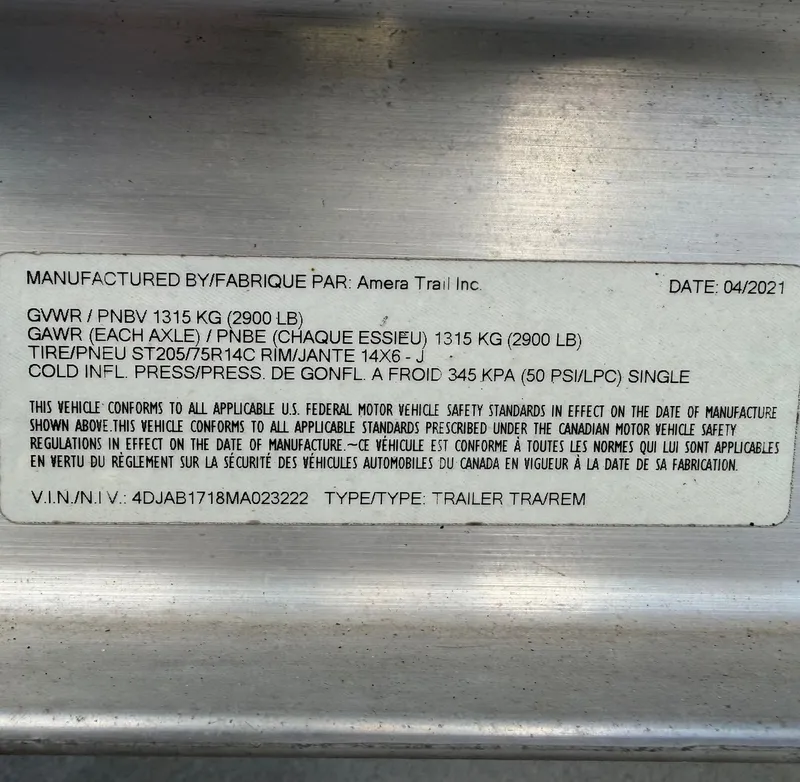 Slide: The Image of Trailer label by Amera Trail Inc., manufactured 04/2021. - 49