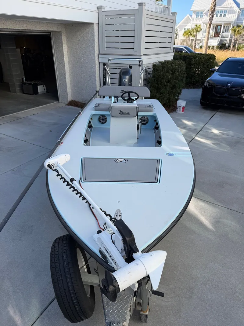 Slide: The Image of 2021 Maverick 17 HPX-S boat on a trailer in a driveway. - 9