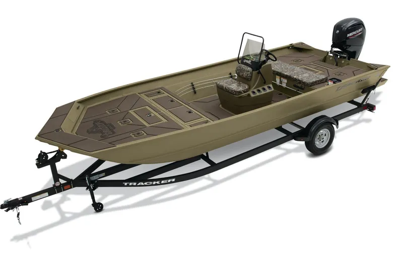 The Image of 2026 Tracker Grizzly 2072 CC boat on trailer, featuring camouflage seating and Mercury outboard motor. - 0