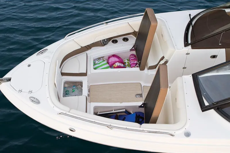Slide: The Image of Manufacturer Provided Image: 2014 Chaparral 307 SSX boat interior with storage compartments. - 12