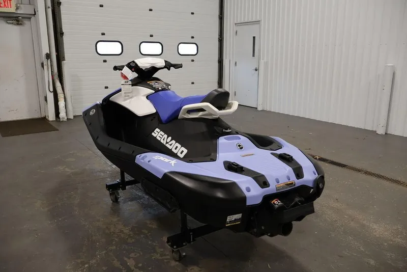 Slide: The Image of 2026 Sea-Doo Spark for 2 jet ski in a garage setting. - 19
