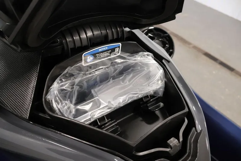 Slide: The Image of 2026 Sea-Doo GTX 170 storage compartment with protective cover. - 17