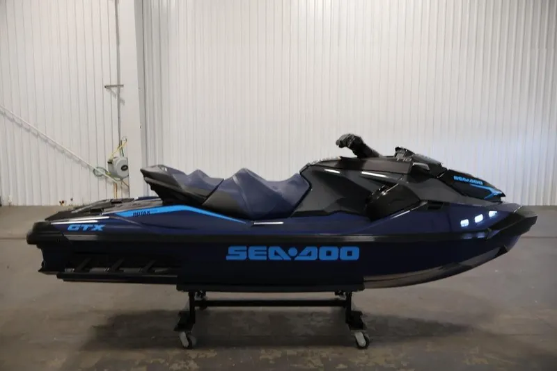 Slide: The Image of 2026 Sea-Doo GTX 170 jet ski in a showroom, side view. - 4