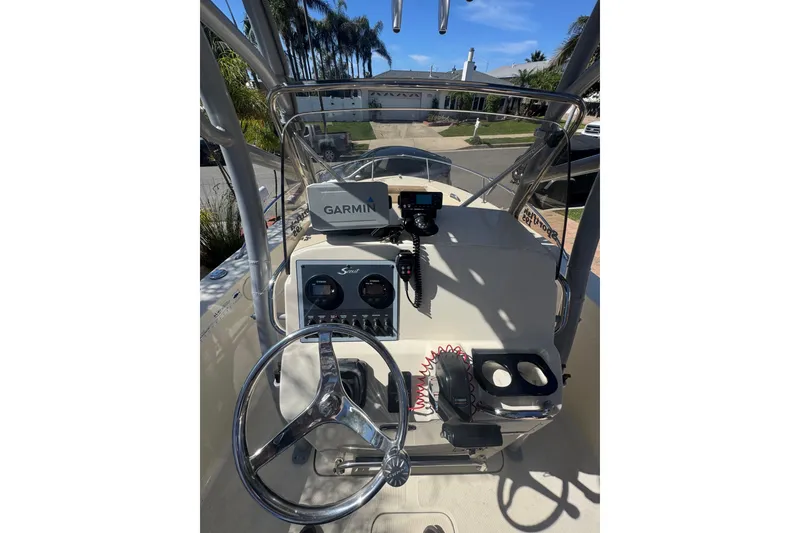 Slide: The Image of 2020 Scout 195 Sportfish boat dashboard with Garmin navigation system. - 20