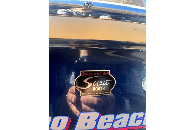 Slide: The Image of Scout 195 Sportfish 2020 boat hull with logo and reflection. - 26