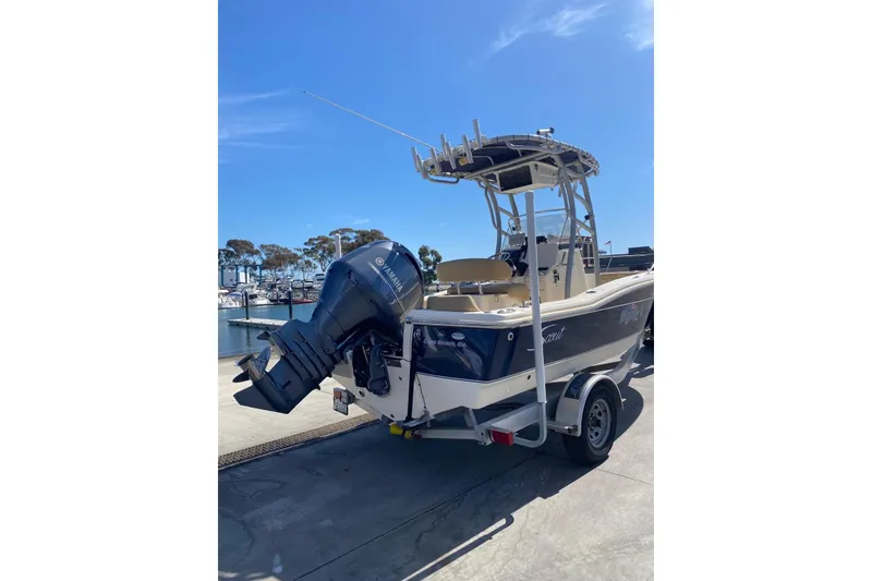 Slide: The Image of 2020 Scout 195 Sportfish boat with Yamaha outboard motor at marina. - 6