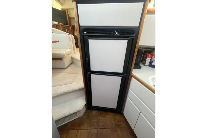 Slide: The Image of Compact refrigerator in 1995 Carver 355 Aft Cabin Motor Yacht interior. - 23