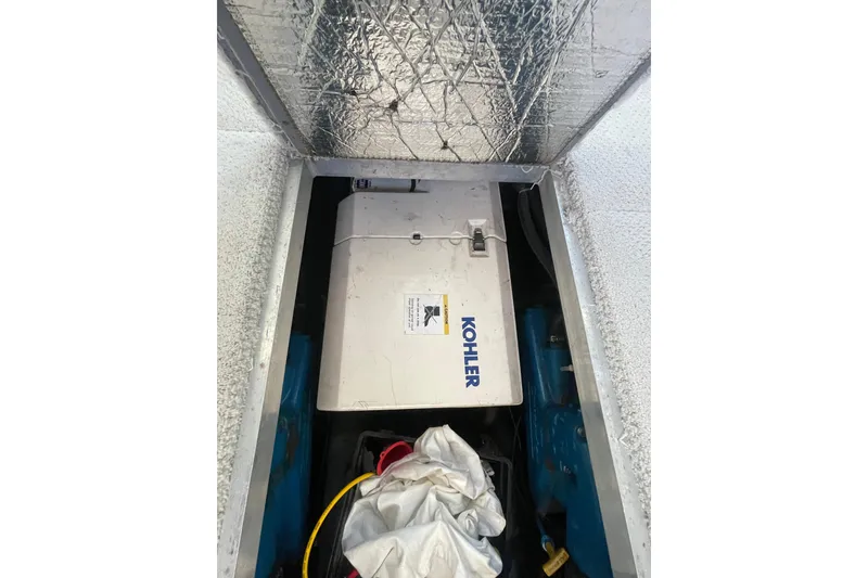 Slide: The Image of Engine compartment of 1995 Carver 355 Aft Cabin Motor Yacht with Kohler generator. - 32