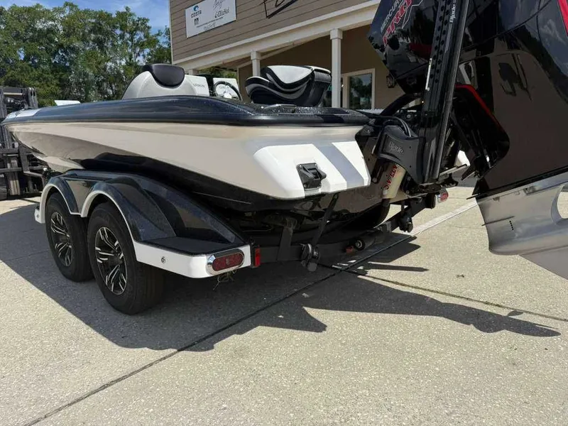 Slide: The Image of 2025 Caymas Bass CX 20 Pro boat on trailer, side view. - 17