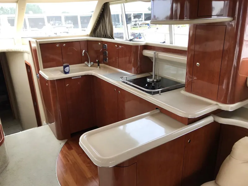 Slide: The Image of Interior of 2003 Sea Ray 480 Sedan Bridge yacht. - 11