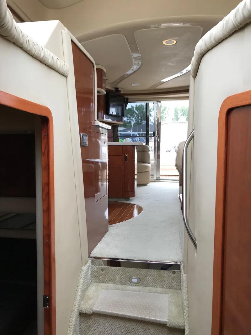 Slide: The Image of 2003 Sea Ray 480 Sedan Bridge bathroom with shower and toilet. - 24