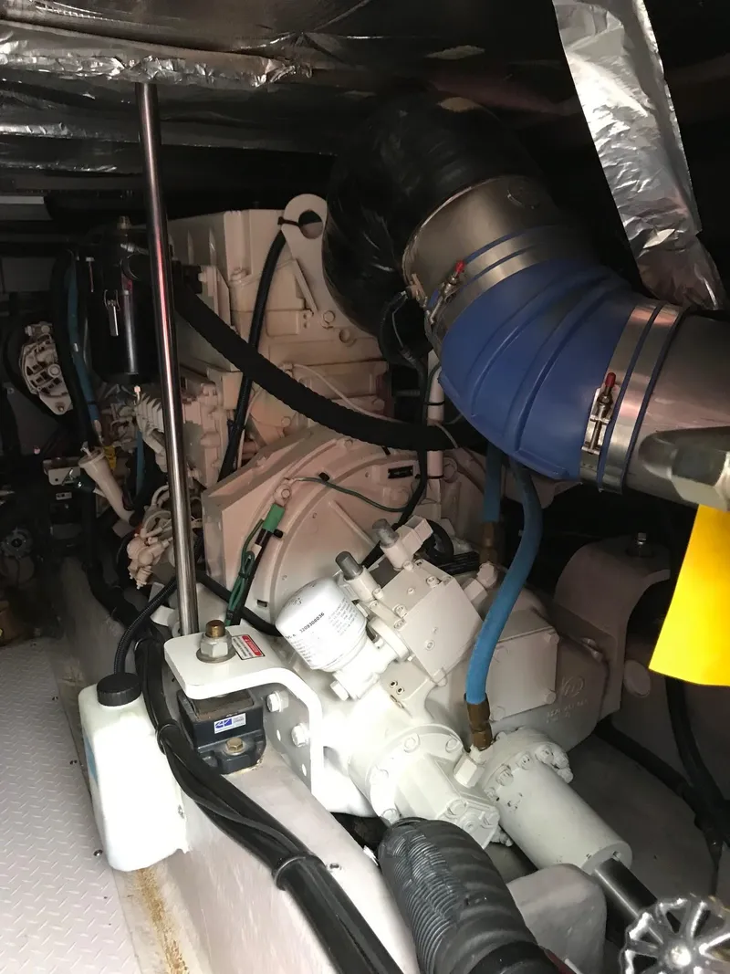 Slide: The Image of Engine room of 2003 Sea Ray 480 Sedan Bridge. - 26