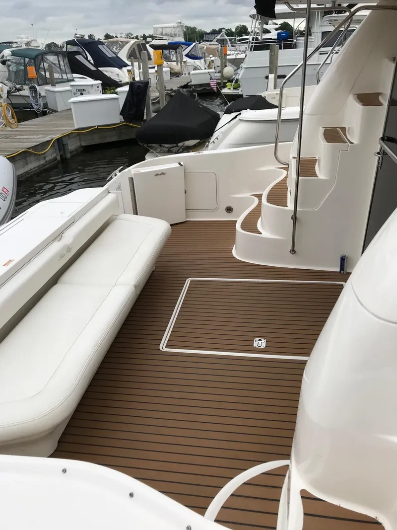 Slide: The Image of 2003 Sea Ray 480 Sedan Bridge with teak deck and stairs. - 3