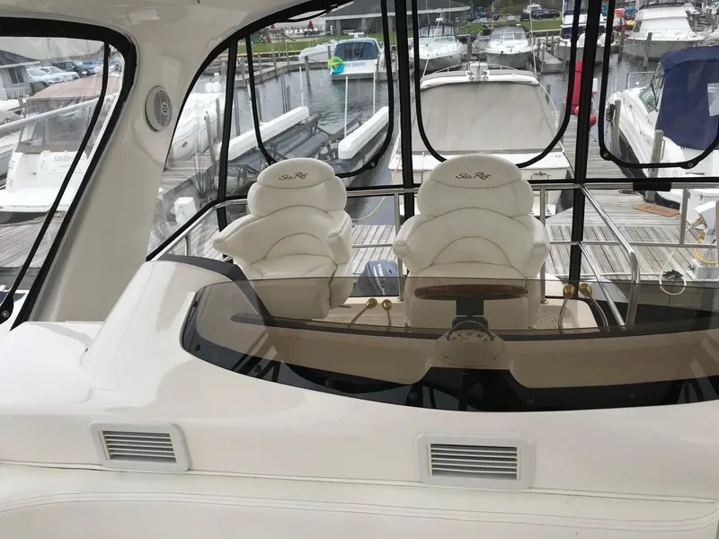 Slide: The Image of Control panel of 2003 Sea Ray 480 Sedan Bridge with controls. - 6