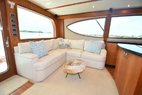 Slide: The Image of Luxurious bedroom interior of 2013 Hatteras GT54 yacht with elegant wood cabinetry. - 11