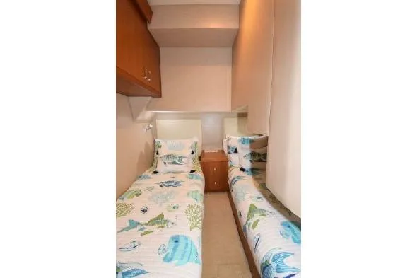 Slide: The Image of Luxurious interior of 2013 Hatteras GT54 yacht with elegant wood finishes and waterfront views. - 5