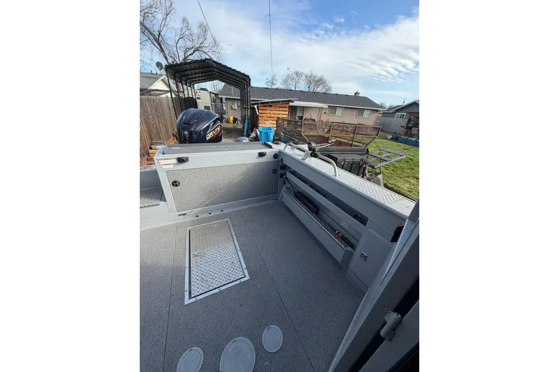 Slide: The Image of 2022 Hewescraft 220 Ocean Pro Hardtop boat interior with outdoor view. - 12