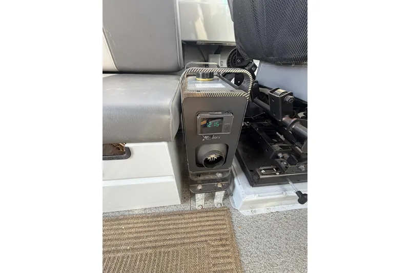 Slide: The Image of Interior of 2022 Hewescraft 220 Ocean Pro Hardtop with seating and control panel. - 6