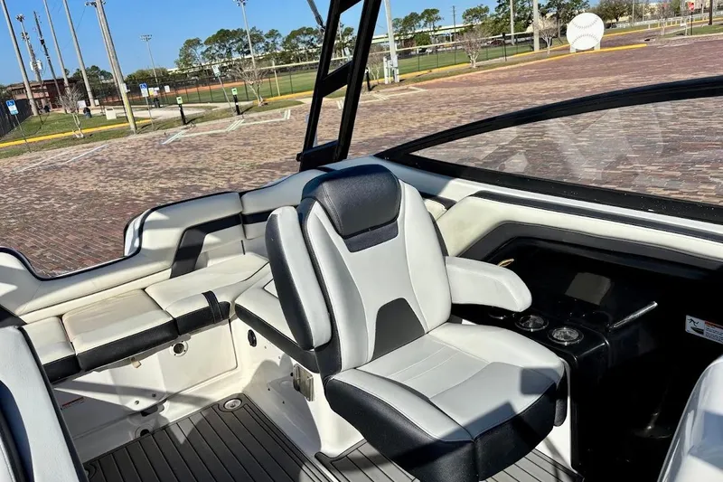 Slide: The Image of 2016 Yamaha Boats AR240 HO interior with sleek seating and modern design. - 17