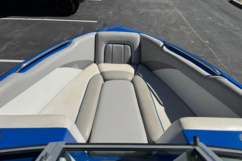 Slide: The Image of 2011 Centurion Avalanche C4 boat interior with blue and gray seating. - 7