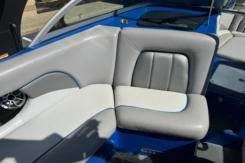 Slide: The Image of 2011 Centurion Avalanche C4 boat interior with gray and blue seating. - 9