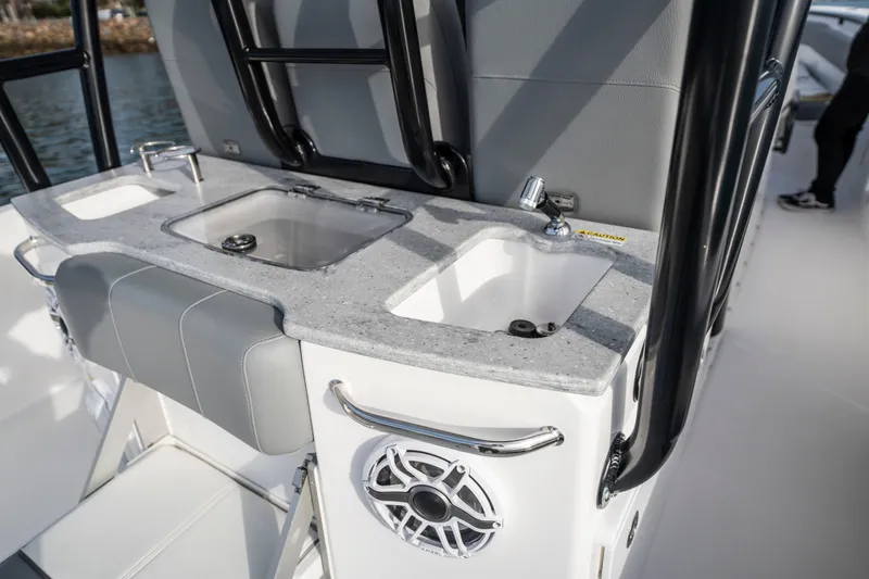 Slide: The Image of 2024 Everglades 365 Center Console boat with sleek sink and countertop design. - 100